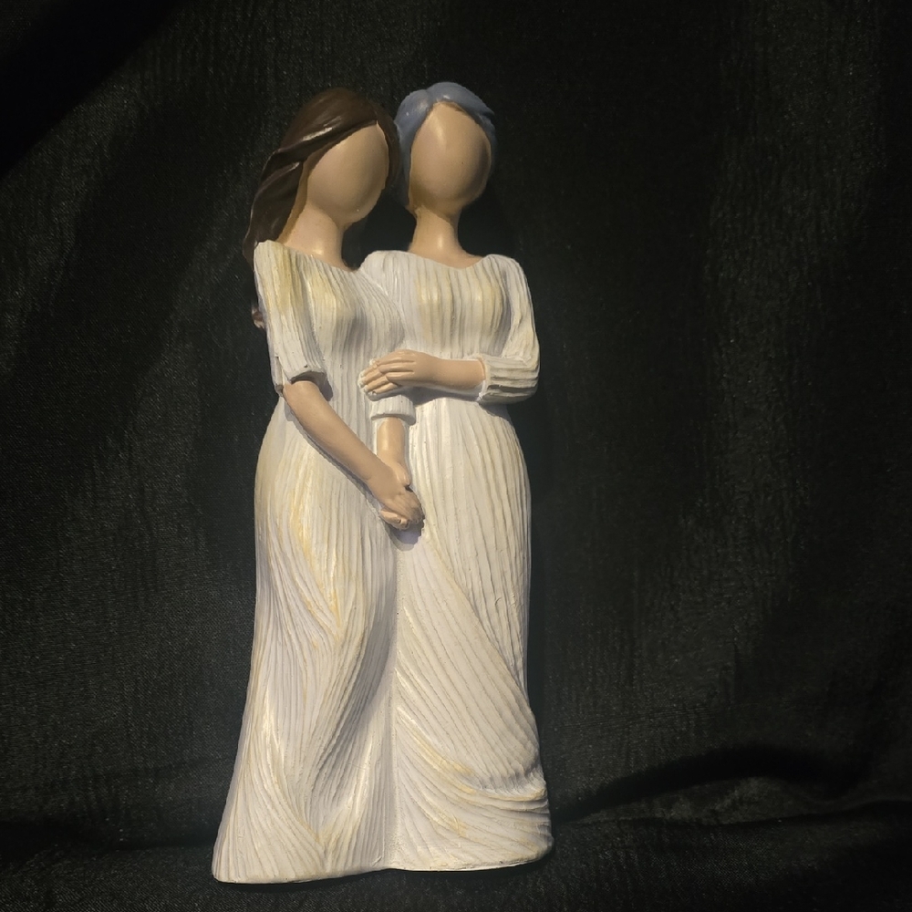Elegant Figurine of Two Women in White Dresses
